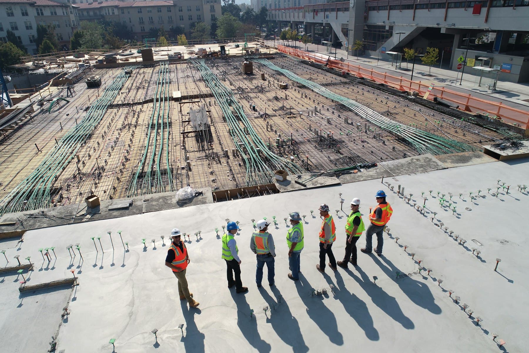 Active construction site with tower cranes
